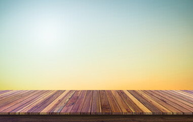 Wooden terrace the blurred background concept. Wood white perspective in front of natural in the sky with light blur background image for product display montage.