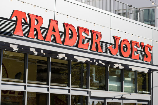 Boston, MA, USA - June 30, 2022: Trader Joe's sign is seen at its store in the Allston neighborhood of Boston. Trader Joe's is an American grocery store chain headquartered in Monrovia, California.