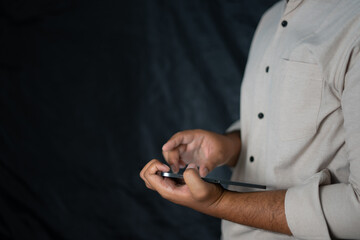 Obraz na płótnie Canvas Business man holding a tablet to check business reports