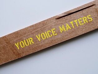 Wood with text written YOUR VOICE MATTERS, concept of expressing one internal world out to the...