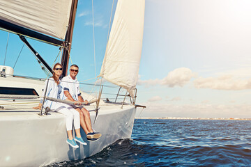 Vacation, ocean and portrait of a couple on a yacht for adventure, freedom and sailing trip. Travel, summer and mature man and woman on a boat in the sea for a romantic seaside holiday in Greece.