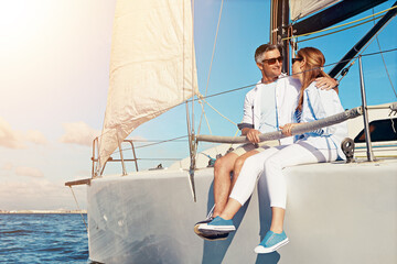 Summer, yacht and love with a couple dating on the ocean for travel, romance or honeymoon...