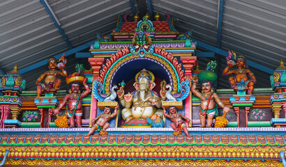 Lord Ganesha above the entrance to a Hindu temple.