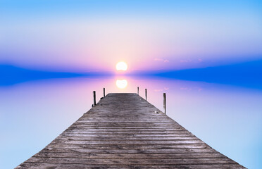 Fototapeta paisaje con un embarcadero en el mar y un amanecer frio y azul obraz