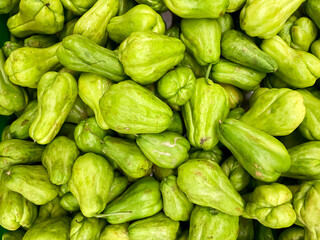 Blurred photo of fresh vegetables in supermarket or groceries
