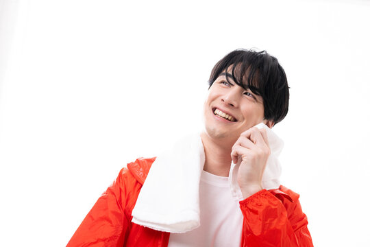 Young Asian Man Sweating At Home Training White Back