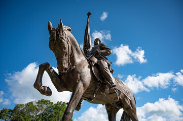 Detail of a large historical sculpture of a knight