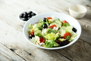 Healthy vegetable salad with olives