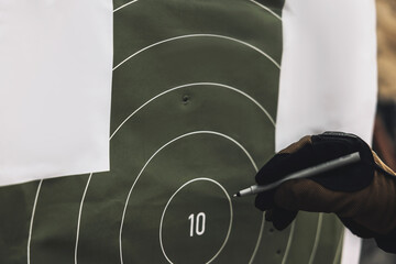 Soldier marking the target for shooting