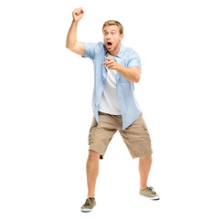 A handsome young man standing alone in the studio and looking shocked isolated on a PNG background.