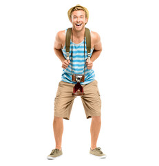 A handsome young tourist standing alone in the studio and feeling excited isolated on a PNG...