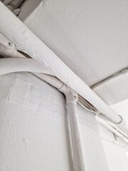 Close up of white painted piping