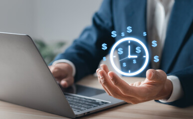 Time is money Concept. Businessman with clock icon and money sign on virtual interface. Business...