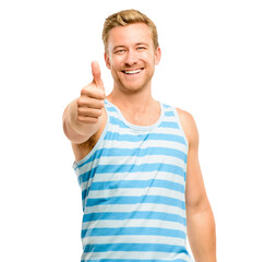 A handsome young man standing alone in the studio and showing a thumbs up isolated on a PNG...