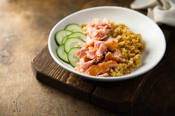 Healthy salmon bowl with spicy rice