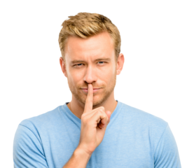 A handsome young man standing alone in the studio with his finger on his lips isolated on a PNG background.