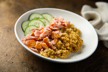 Fototapeta premium Healthy salmon bowl with spicy rice