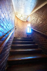 Stairs inside a fortified ancient tower or fort. Defense and military affairs in the Middle Ages