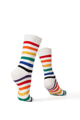 Detailed shot of bright colorful rainbow striped socks with a wide rubber band. The socks are shaped as walking human legs. The unisex striped socks are isolated on a white background.