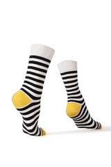 Detailed shot of striped socks with a wide rubber band. The socks are shaped as walking human legs. The black and white striped socks with yellow heel and toe are isolated on a white background.