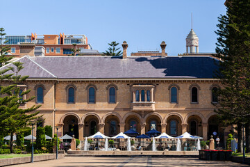 Old historical customs house hotel building with café in front in Newcastle