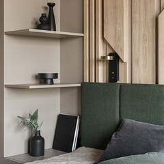 Modern decorations on shelves in bedroom