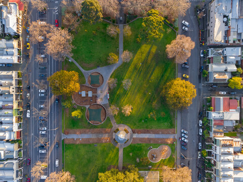 Aerial view of a suburban park bordered by rows of housing