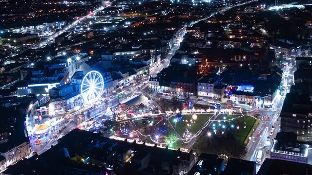 Aerial time lapse of Eire square, Galway, during Christmas and at night.
The shot reveals a big part of the city and its traffic.
Ireland