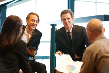 group of business people meeting and talking about work or project with colleague in the office