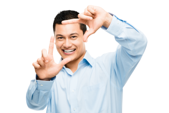 An asian businessman framing his face using his fingers isolated on a PNG background.