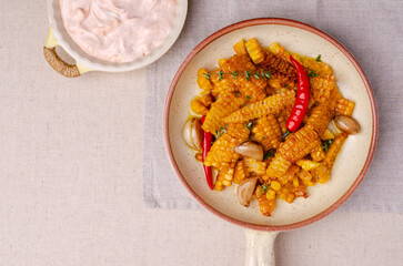 Fried spicy corn slices