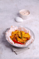 Fried spicy corn slices