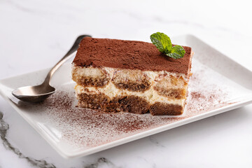 Homemade tiramisu on white background