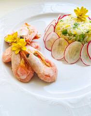 Asian style fried rice with eggs and shrimp. Seafood, gourmet dinner.