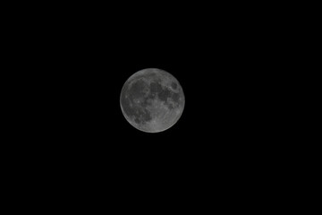full moon close up on black background