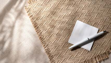 Blank paper sheet card with mockup copy space and floral sunlight shadows on beige background. Flat lay, top view minimal business brand template