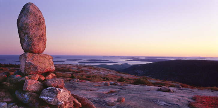 A pile of rocks marks a trail on Cadillac Mountain in Maine, USA.
