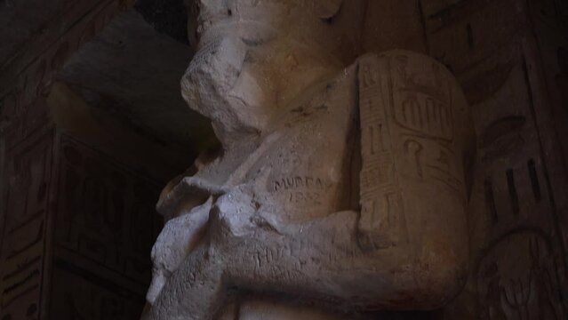 Panning down shot of statue inside Abu Simbel Temple