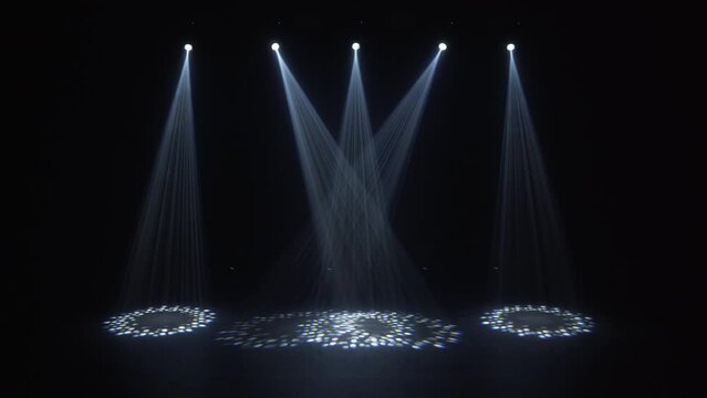 Stage lighting in the studio. Professional concert light on stage. Prerequisites for various projects. Lighting equipment in a nightclub. The concept of nightlife, music, entertainment and technology.