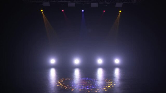 Stage lighting in the studio. Professional concert light on stage. Prerequisites for various projects. Lighting equipment in a nightclub. The concept of nightlife, music, entertainment and technology.