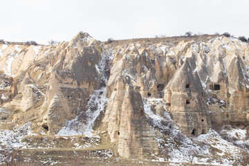 Fototapeta na wymiar Rocks with cave houses at Goreme national park Turkey