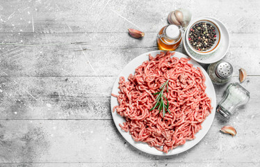 Raw minced meat with spices and herbs .