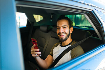 Excited man passenger taking a ride share trip