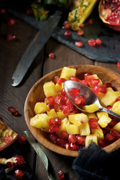 Pineapple chunks and pomegranate seeds
