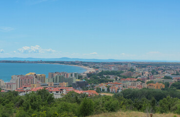 Landscape of a resort with hotels and parks on the coast of the sea with sandy beaches on a clear sunny day
