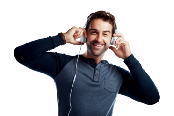 A handsome young man using headphones isolated on a PNG background.