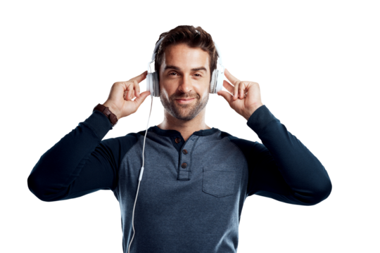 A handsome young man using headphones isolated on a PNG background.