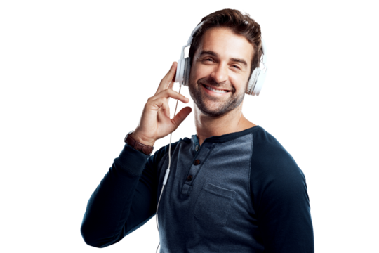 A handsome young man using headphones isolated on a PNG background.