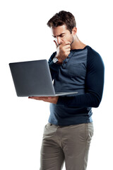 A handsome young man using a laptop and looking confused isolated on a PNG background.