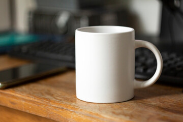 White mug on the desktop